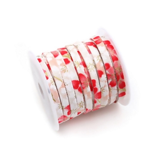 Cordon de 5mm de largeur en coton avec fleurs sur fond rose clair et blanc. petites touches de doré. vendu au mètre. ruban, cordon, biais.