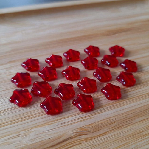 X10 perles étoiles verre tchèque de 8mm. bordeaux, rouge foncé, light siam transparentes
