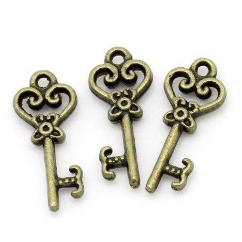 5 breloques pendentifs clef n°7 en métal col bronze 