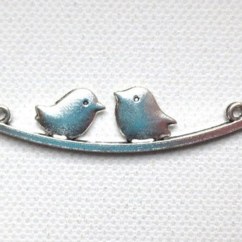2 connecteurs chandeliers oiseaux sur une branche en métal argenté