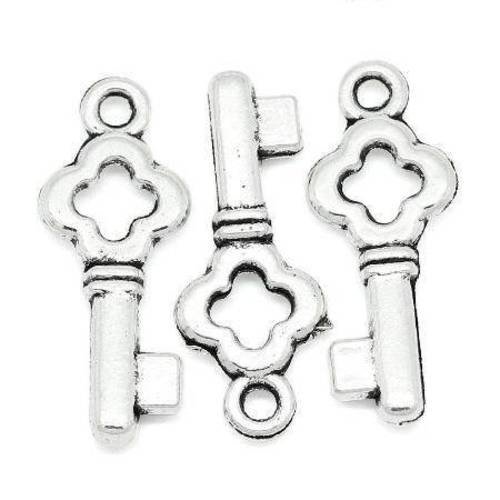 10 breloques petites clefs en métal argenté 