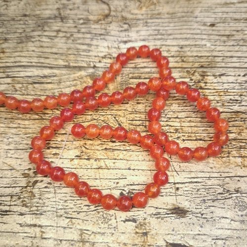 1 fil 63/65 perles de jade 6mm ronde orange marbré