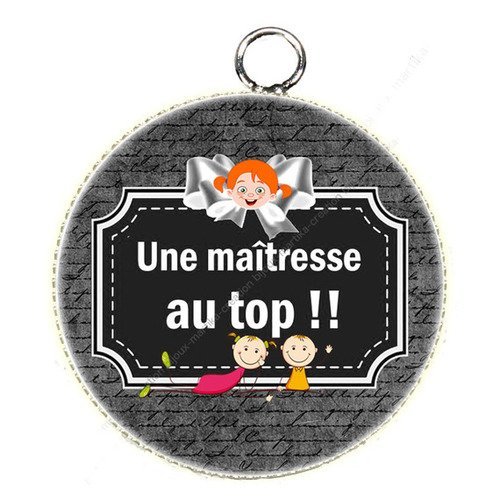 Pendentif cabochon en résine epoxy une maîtresse au top n°52 