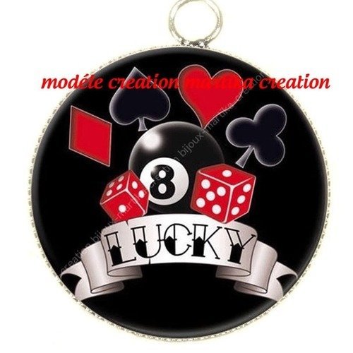 Pendentif cabochon metal et epoxy 25 mm &quot;jeu &quot; n°1 