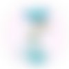 Cabochon résine a coller de 25 mm fleur coquelicot turquoisefond blanc n° 1 