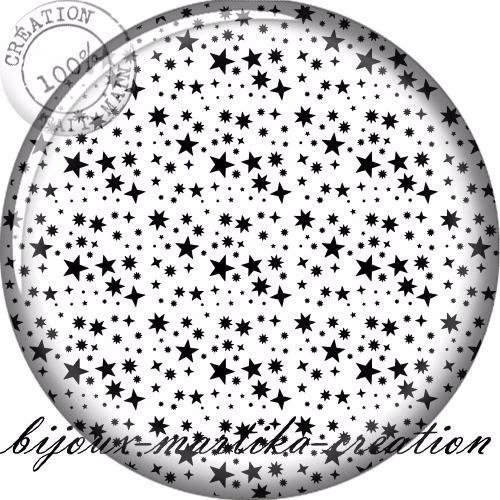 1 cabochon résine 25 mm étoile blanche sur fond noire :a266