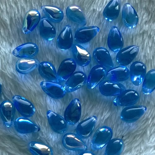 Lot 25 gouttes de boheme 6x9mm en verre coloris light sapphire ab 30020/28701 - bleu avec des reflets