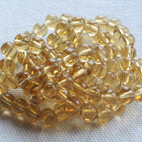 30 perles en verre jaune miel +/- 6mm 