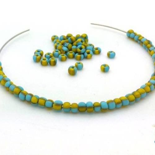 10gr perles rocailles, rayures bicolores bleu et vert 2x2.5mm (roc36) 