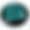 1 pendentif médaillon en céramique peinte, fleur bleu/vert/noir, diamètre 45mm (pc134) 