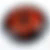 1 pendentif médaillon en céramique peinte, fleur noir/orange, diamètre 45mm (pc133) 