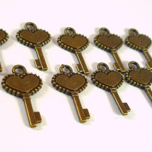 20 breloques clés petit coeur bronze 4x12mm (bre483) 
