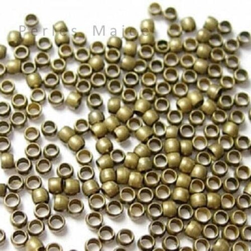 Perles à écraser couleur bronze vendu par 4gr environ 200 unités