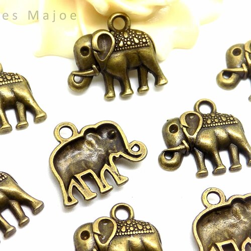 10 breloques éléphant style tibétain couleur bronze dimensions 17 x 13 x 3 mm