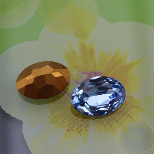 1 cabochon swarovski ovale 18x13 mm  light sapphire + 1 sertissure  art.4140