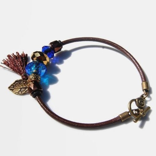 Bracelet cuir, bleu saphir vieil or/bronze, perles style pandora, pampille feuille et petit pompon