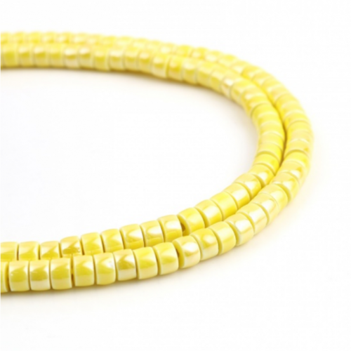 Ps11707433 pax de 40 perles intercalaires rondelles heishi céramique 6 par 4mm