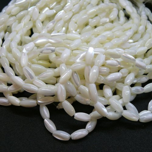 H11k00806 lot de 1/2 fil environ 30 perles oblong, nacre forme grain de riz 4 par 7 mm, coloris blanc irisé