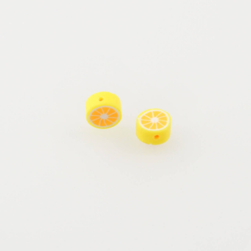 2 perles "citron jaune" en pâte polymère