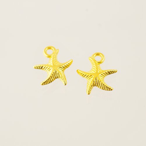 2 breloques dorées étoiles de mer