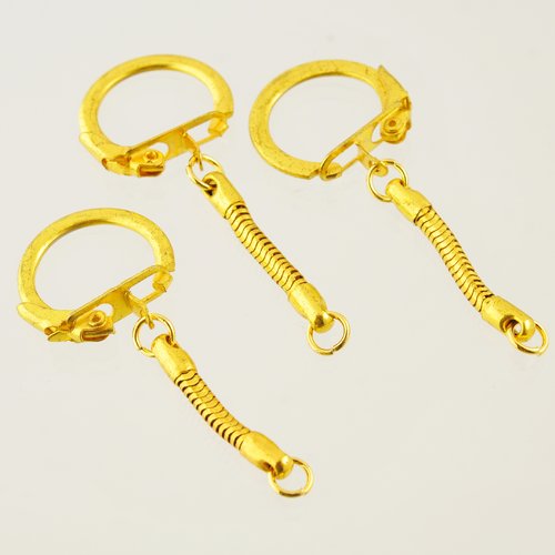 3 porte-clefs dorés