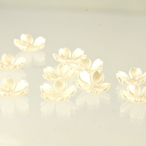 Coupelles fleurs blanc cassé 15 mm