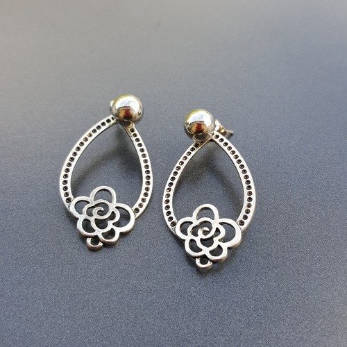 Boucles d'oreilles ovales avec fleur en métal argenté vielli