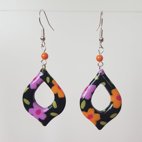 Boucles fleuris rose et orange fond noir