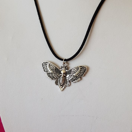 Collier papillon & skull