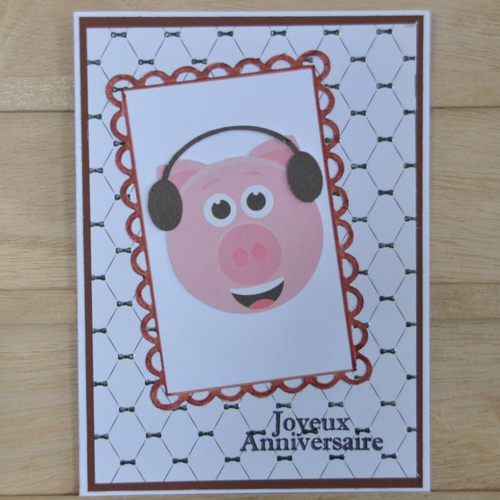 Carte double d'anniversaire "tete de cochon avec des ecouteurs"