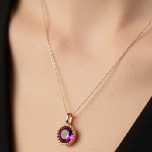 Pendentif secret pierre rouge or 18 carats