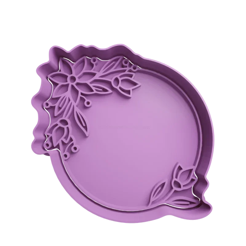 Emporte-pièce en forme de cercle avec des feuilles de feuillage
