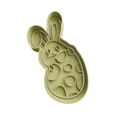 Lapin de pâques avec emporte-pièce en forme d'œuf