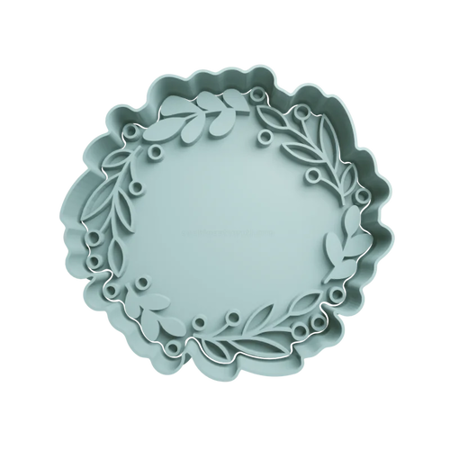 Emporte-pièce en forme de cercle avec des feuilles de feuillage