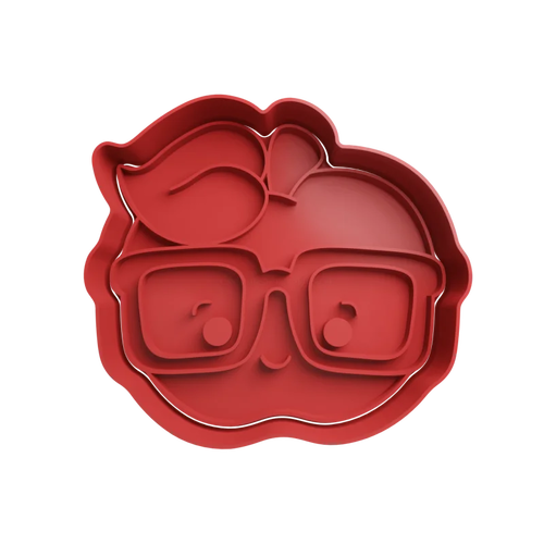 Emporte-pièce en forme de pomme portant des lunettes