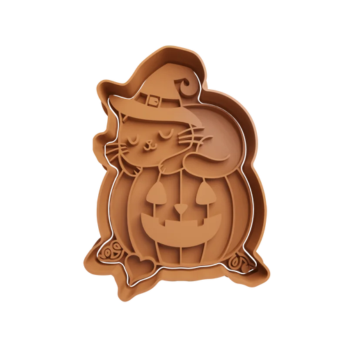 Emporte-pièce de chat dans une citrouille d'halloween