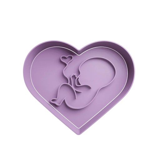 Emporte-pièce bébé dans un cœur