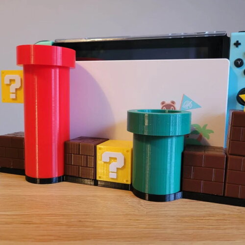 Nintendo switch avec un dock complet dans le style mario bros