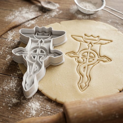 Emporte-pièce croix de flamel alchimie 8 cm