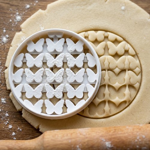 Emporte-pièce multi-papillons 8cm plastique noir