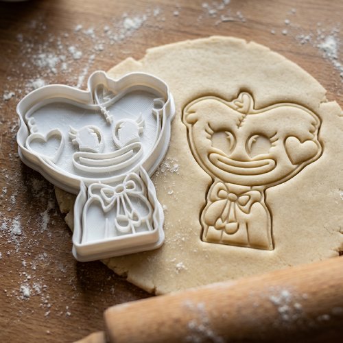 Emporte-pièce poupée sourire nœud papillon 8cm biscuit