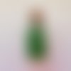 Perles de rocaille dans fiole en verre couleur vert