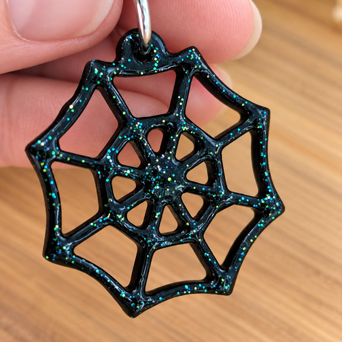 Boucles d'oreilles" arécnea" toiles d'araignée noire paillettés
