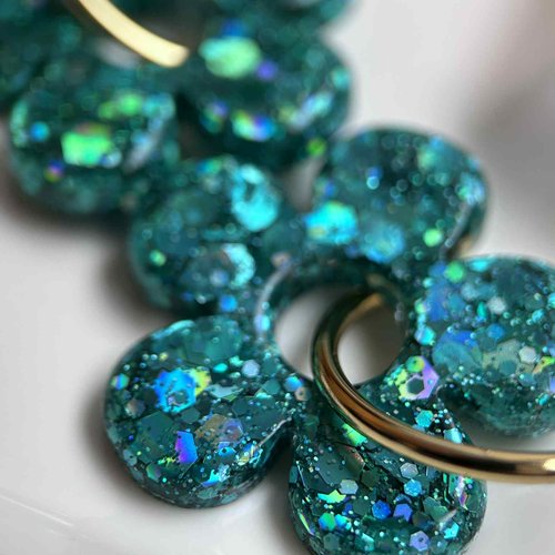 Boucles d'oreilles créoles doré en acier inoxydable avec pampilles fleurs