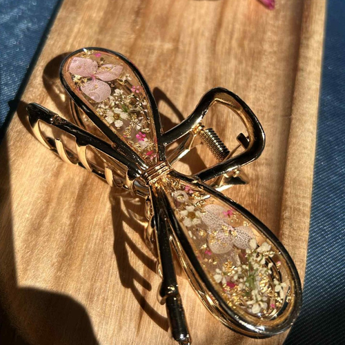 Pince à cheveux en forme de nœud avec fleurs séchées