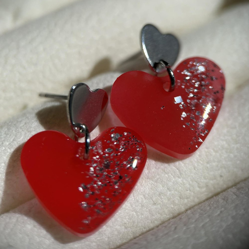 Boucles d'oreilles double cœur pendante