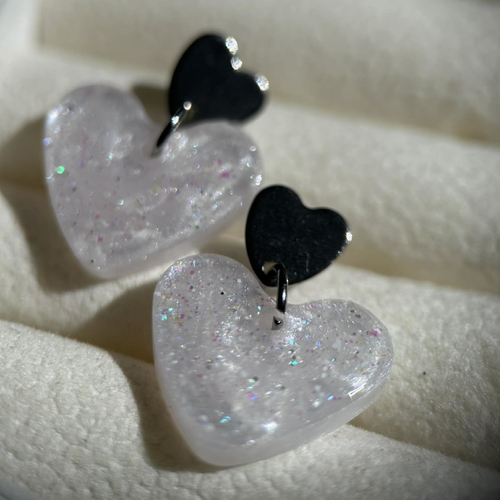 Boucles d'oreilles double cœur pendante