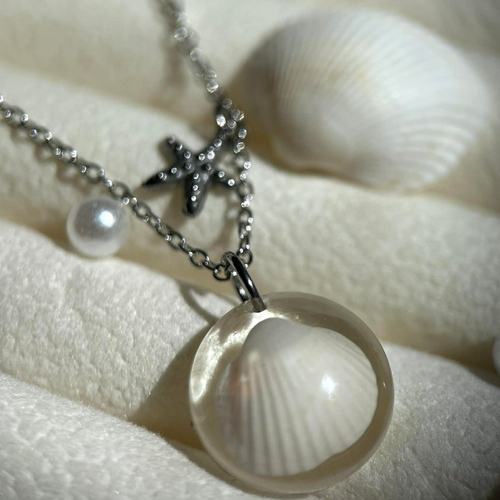 Collier argenté en acier inoxydable - coquillage véritable