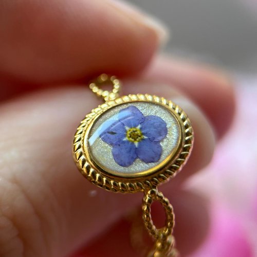 Bague doré ovale - fleur myosotis