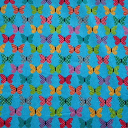 Papillons multicolores sur fond bleu 